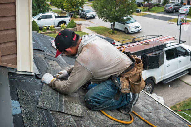 Professional Roofing technician working in Woodville, CA